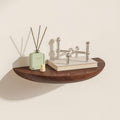 Half-round floating wall shelf with a wood grain finish