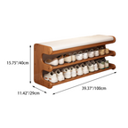 Brown bamboo shoe bench with white padded seat and two open storage shelves