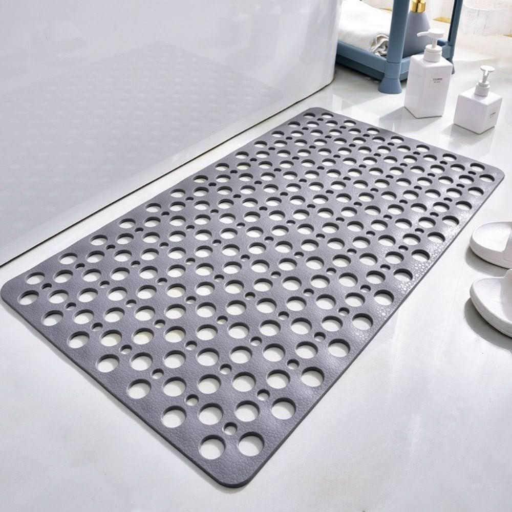 Perforated non-slip shower mat with suction cups
