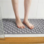 Perforated non-slip shower mat with suction cups