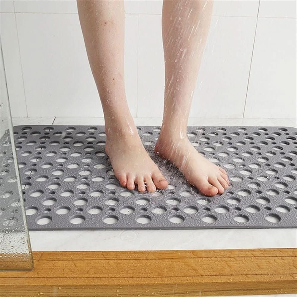 Perforated non-slip shower mat with suction cups