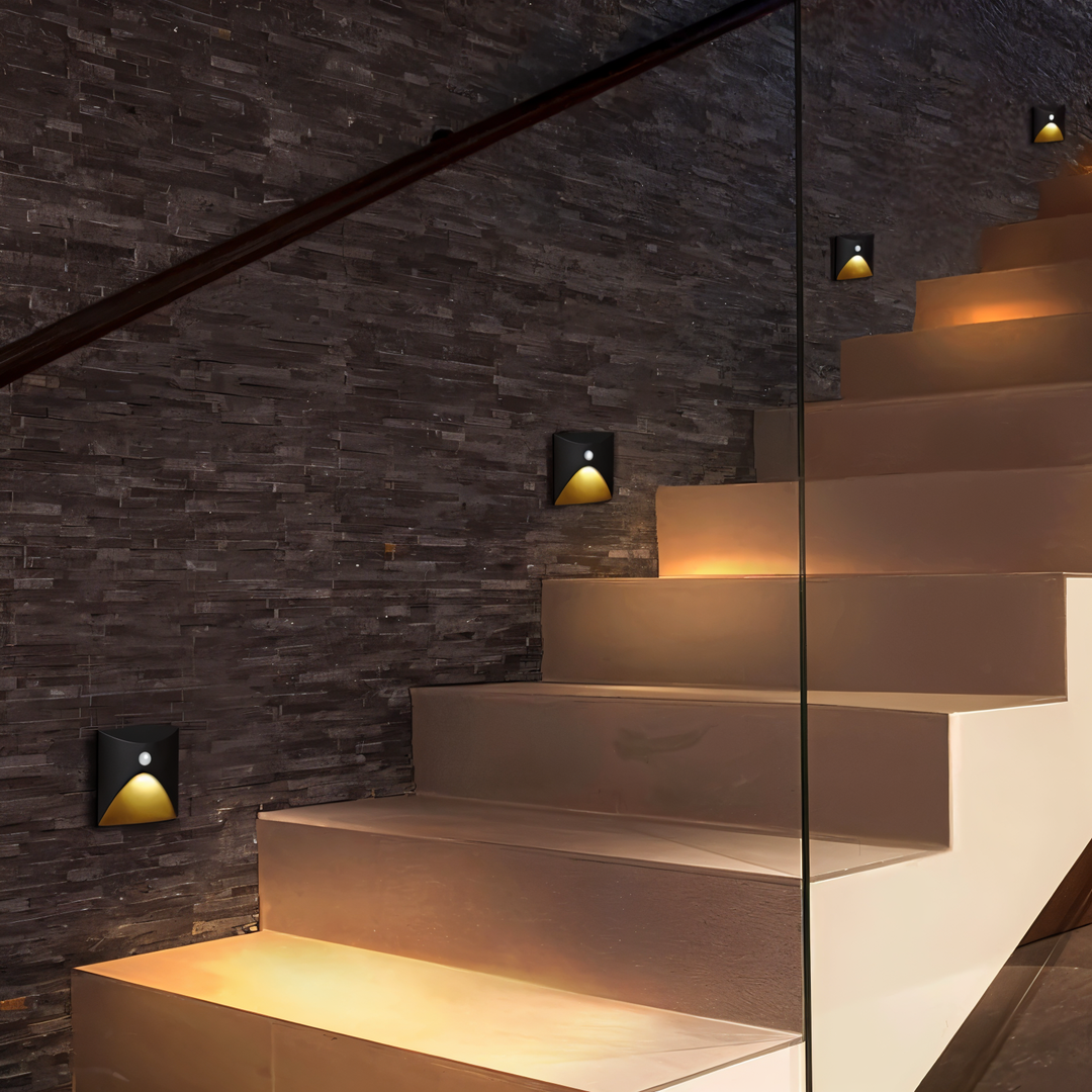 LED wall light with curved front detail and motion sensor