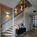 Geometric LED wall lamp with motion sensor and up-and-down lighting