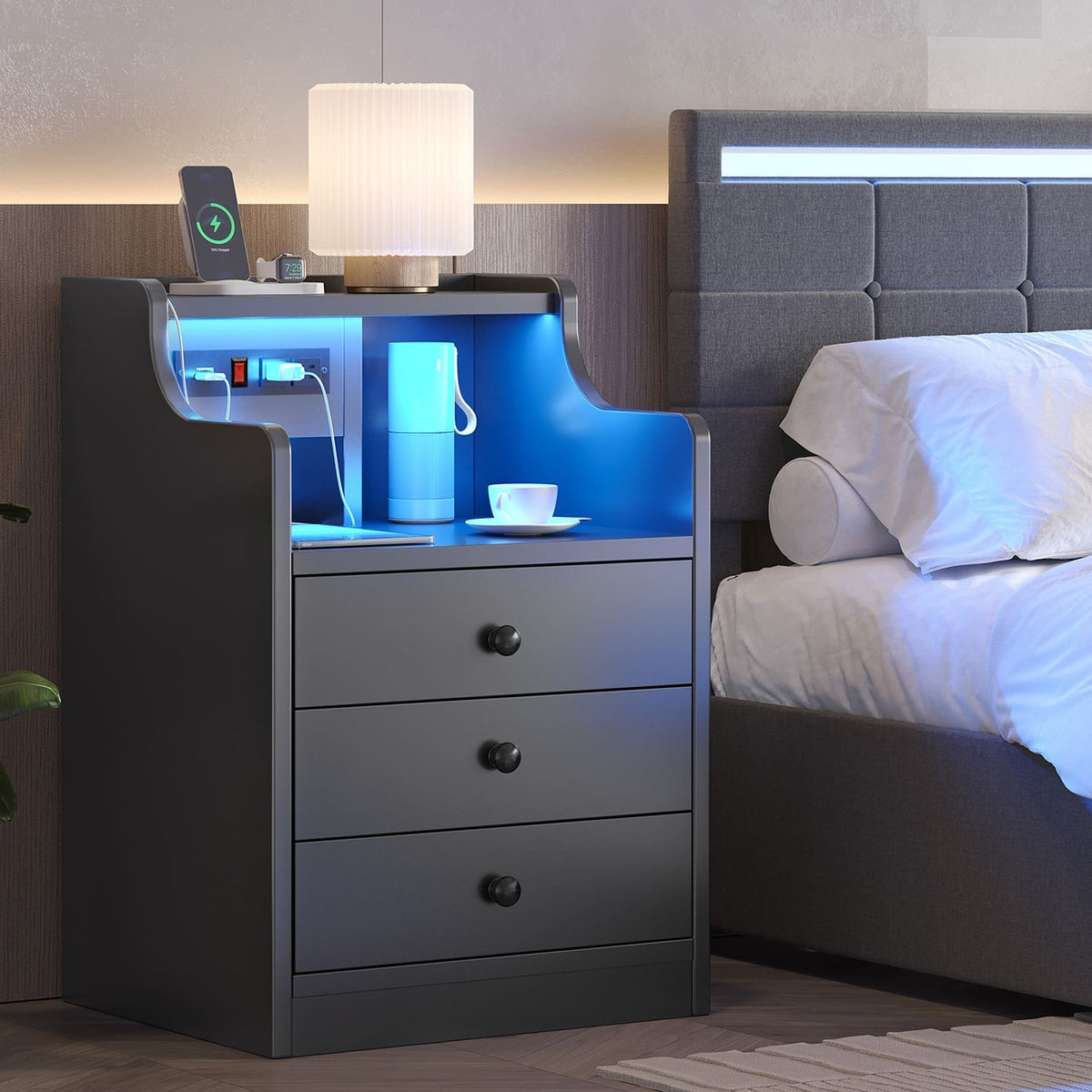 Black LED bedside table with three drawers, illuminated shelf and built-in power panel